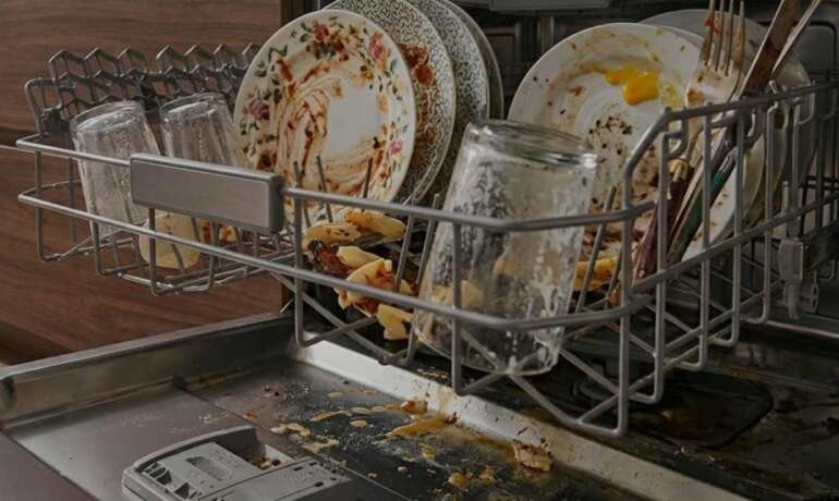 Dishwasher Not Cleaning Dishes? Causes & Fixes